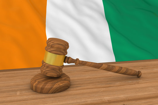 Ivorian Law Concept - Flag of Cote d'Ivoire Behind Judge's Gavel 3D Illustration