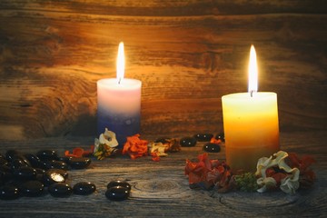 candles on rustic wooden background