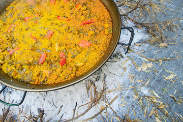 Cooking of a raditional spanish dish paella