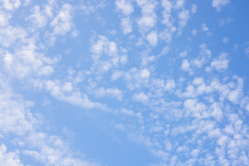 white fluffy clouds in the blue sky