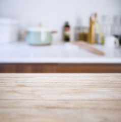 Table top with Blur Kitchen Pantry with kitchenware background