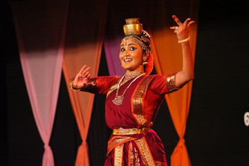 pot and plate dance or tarangam is an integral part of kuchipudi dance,making it different form other dance forms