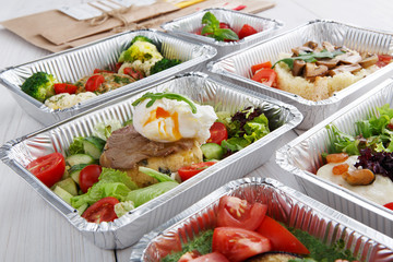 Healthy food in boxes, diet concept.