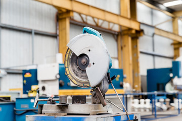 Asian worker in production plant on the factory floor