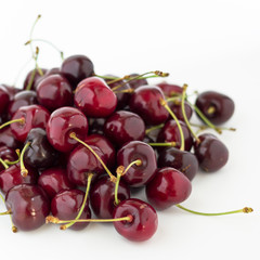 Cherries on white background