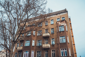 Large single brown brick apartment building