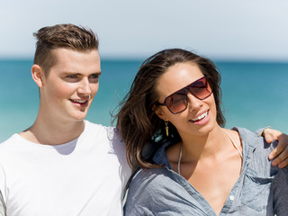 Company of young people on the beach