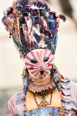 Venetian masked model from the Venice Carnival in Italy - 116677246
