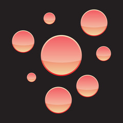 Set of yellow and red buttons on black background.