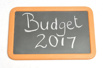 Fototapeta premium A black board with the words budget 2017