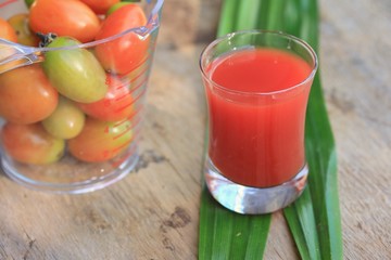Fresh tomatoes and juice