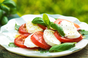 Classic Caprese Salad with Mozzarella Cheese, Tomatoes and Basil