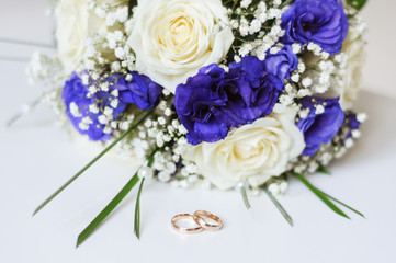 The bride's bouquet and wedding rings