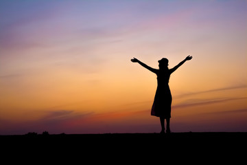 Fototapeta premium The silhouette of happy asian woman