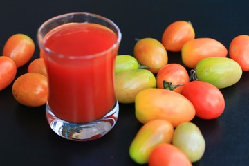 Fresh tomatoes and juice