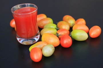 Fresh tomatoes and juice