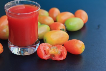 Fresh tomatoes and juice