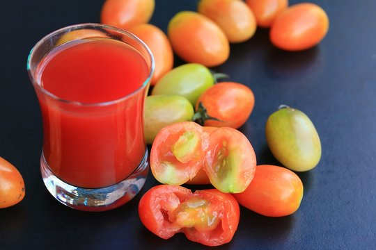 Fresh tomatoes and juice