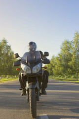 Fototapeta na wymiar Traveling on a motorcycle on the mountain roads.