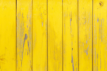 Fototapety  Vertical background of the wooden planks with cracked yellow paint