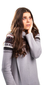 Young Lady With Horrified Face. Woman In Patterned Sweatshirt. Stress And Shock. What Could Have Gone Wrong.