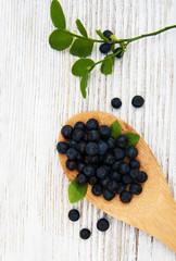 Blueberries on a old wooden background