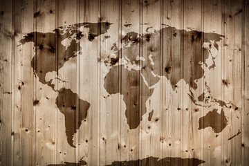 World map on wooden wall. Vintage