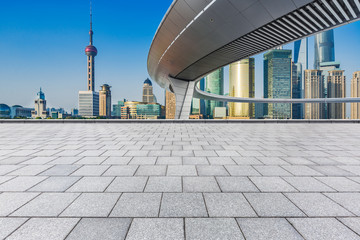 Empty brick floor with modern building in Shanghai