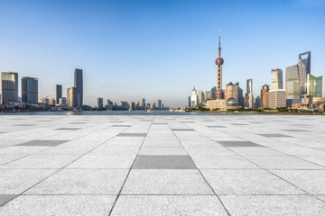 Empty brick floor with shanghai skyline and cityscape,china.