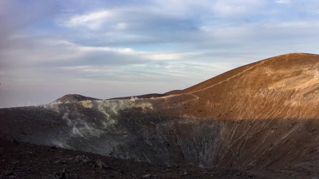 4K time lapse of crater with smoke on an active volcano