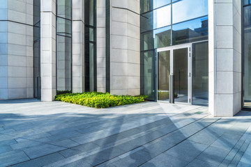 Empty brick floor with modern building in Shanghai