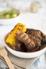 Grilled meat with corn