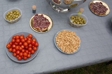 Beautifully decorated catering banquet table, different food snacks and appetizers