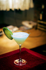 cucumber mint modern trendy martini cocktail in bar