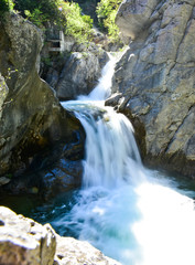 Fototapeta na wymiar Zeus waterfall in the Olymp Mountain in Greece. Tourist attracti
