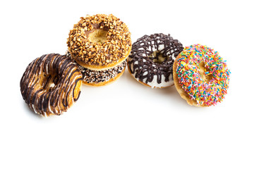 various donuts on white background