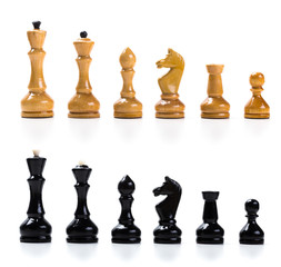 wooden chess set  lined up in rows isolated