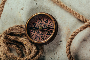 Compass on a gray gradient background