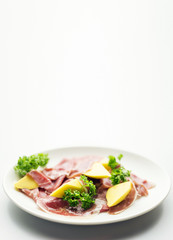 cured parma serrano style ham with fresh mango salad snack