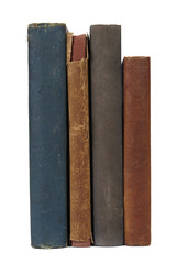 Spines of old hardback books isolated on a white background
