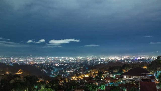 Panoramic view of the Bandung city in Indonesia at night. 4K Timelapse - Bandung, West Java, Indonesia, June 2016.