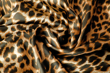 closeup of the leopard print fabric texture © severija
