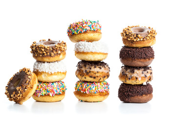 various donuts on white background