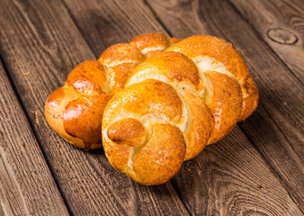 assortment of baked bread on wood table