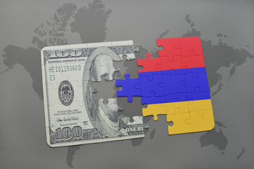 puzzle with the national flag of armenia and dollar banknote on a world map background.