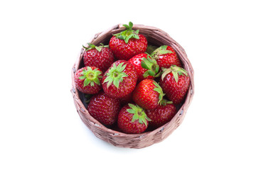 strawberries in a wooden bowl. top view