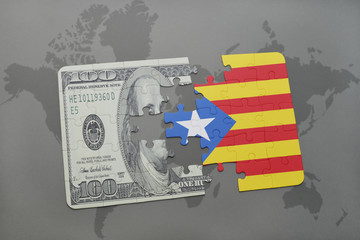 puzzle with the national flag of catalonia and dollar banknote on a world map background.