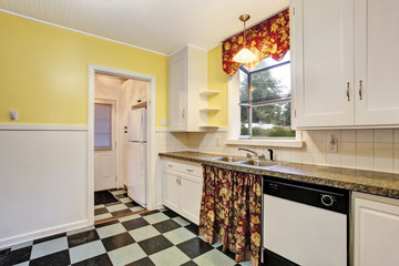 Classic kitchen room interior with white cabinets, granite counter top