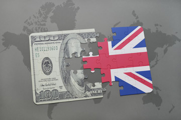 puzzle with the national flag of great britain and dollar banknote on a world map background.