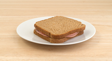 Mortadella sandwich on wheat bread.